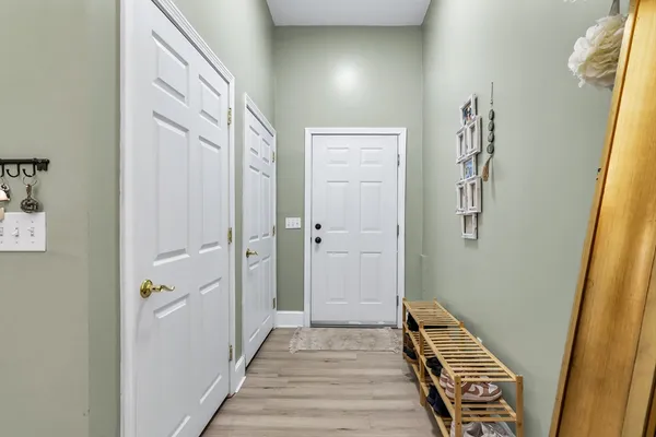 a kitchen with stainless steel appliances granite countertop a refrigerator stove and a sink