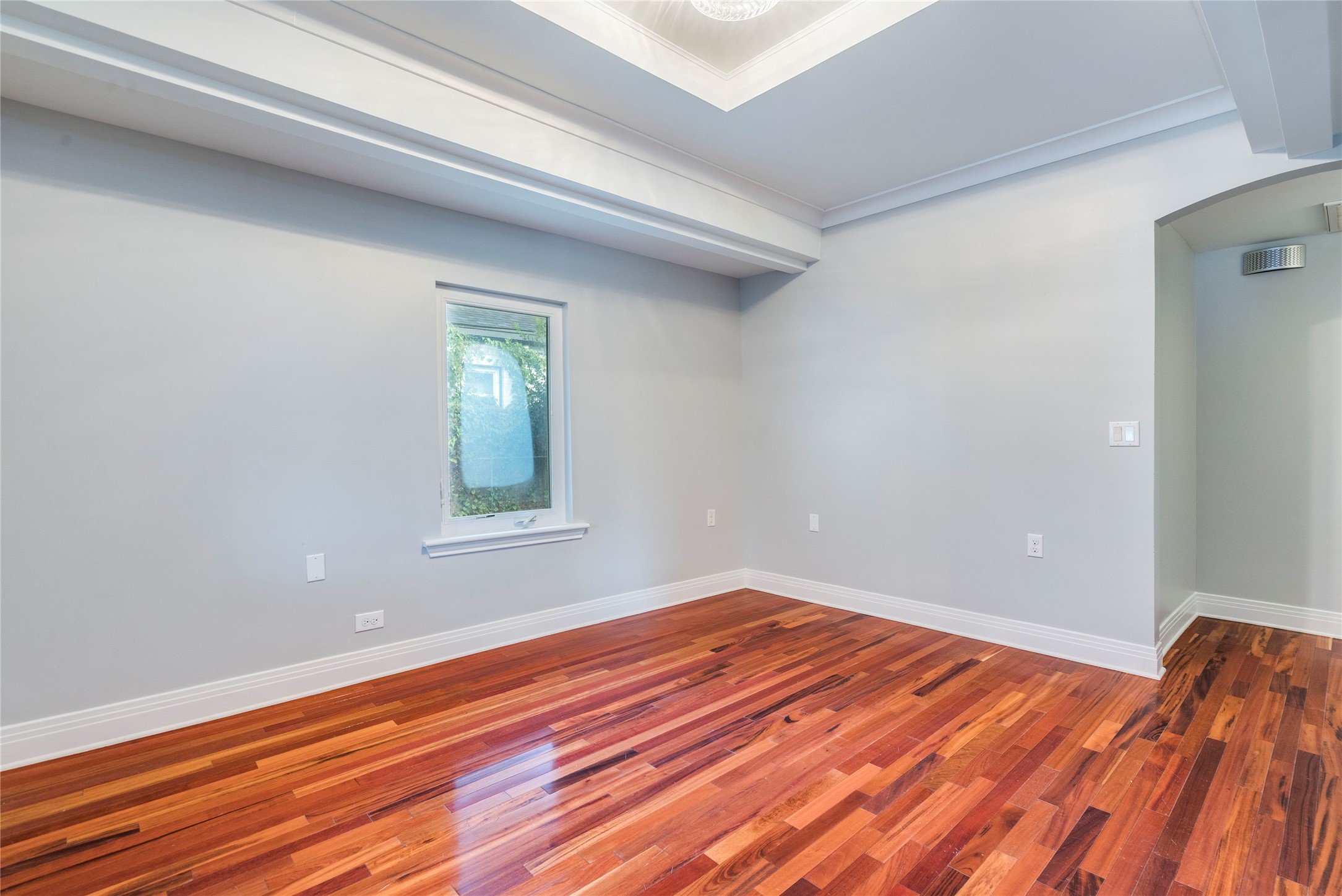 2314 Santa Rosa Street Austin, TX 78702 - Photo 3 of 29 Rich hardwood floors complement a neutral palette, creating an inviting, versatile space.