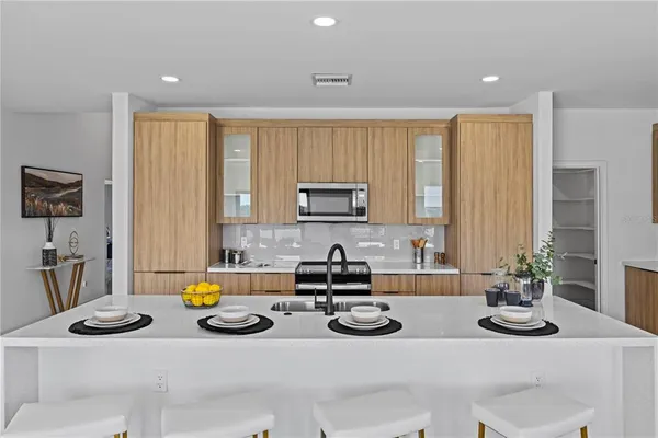 a view of kitchen and a sink