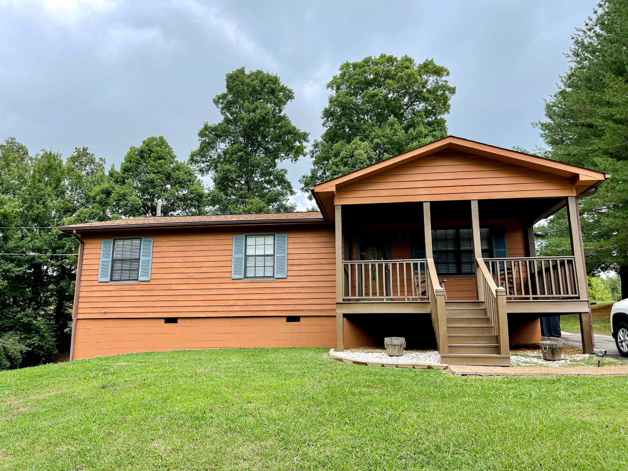 4935 Maple Hill Road Loudon, TN 37774 - Photo 1 of 16 a house with lots of trees in the background