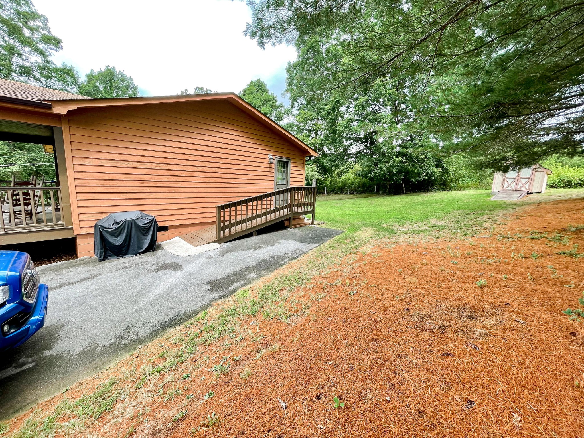 4935 Maple Hill Road Loudon, TN 37774 - Photo 3 of 16 a view of backyard with a garden and trees