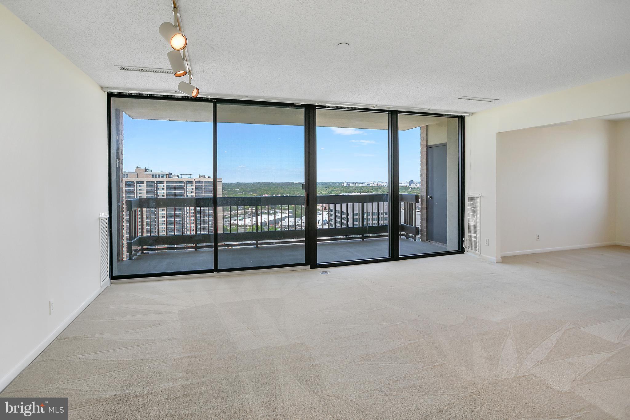 5505 Seminary Road, Unit 2605N Falls Church, VA 22041 - Photo 13 of 53 a view of an empty room with a balcony