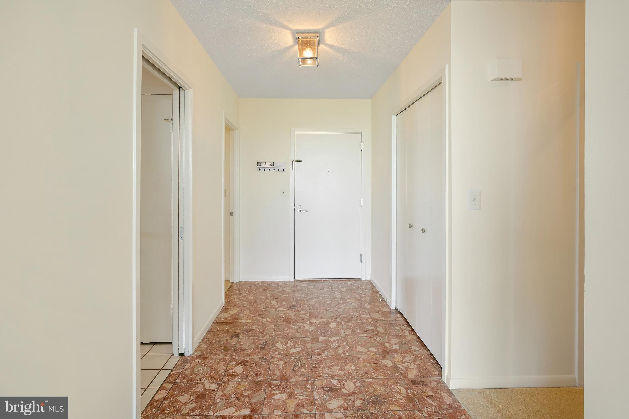5505 Seminary Road, Unit 2605N Falls Church, VA 22041 - Photo 24 of 53 a view of a hallway with a livingroom and a bathroom