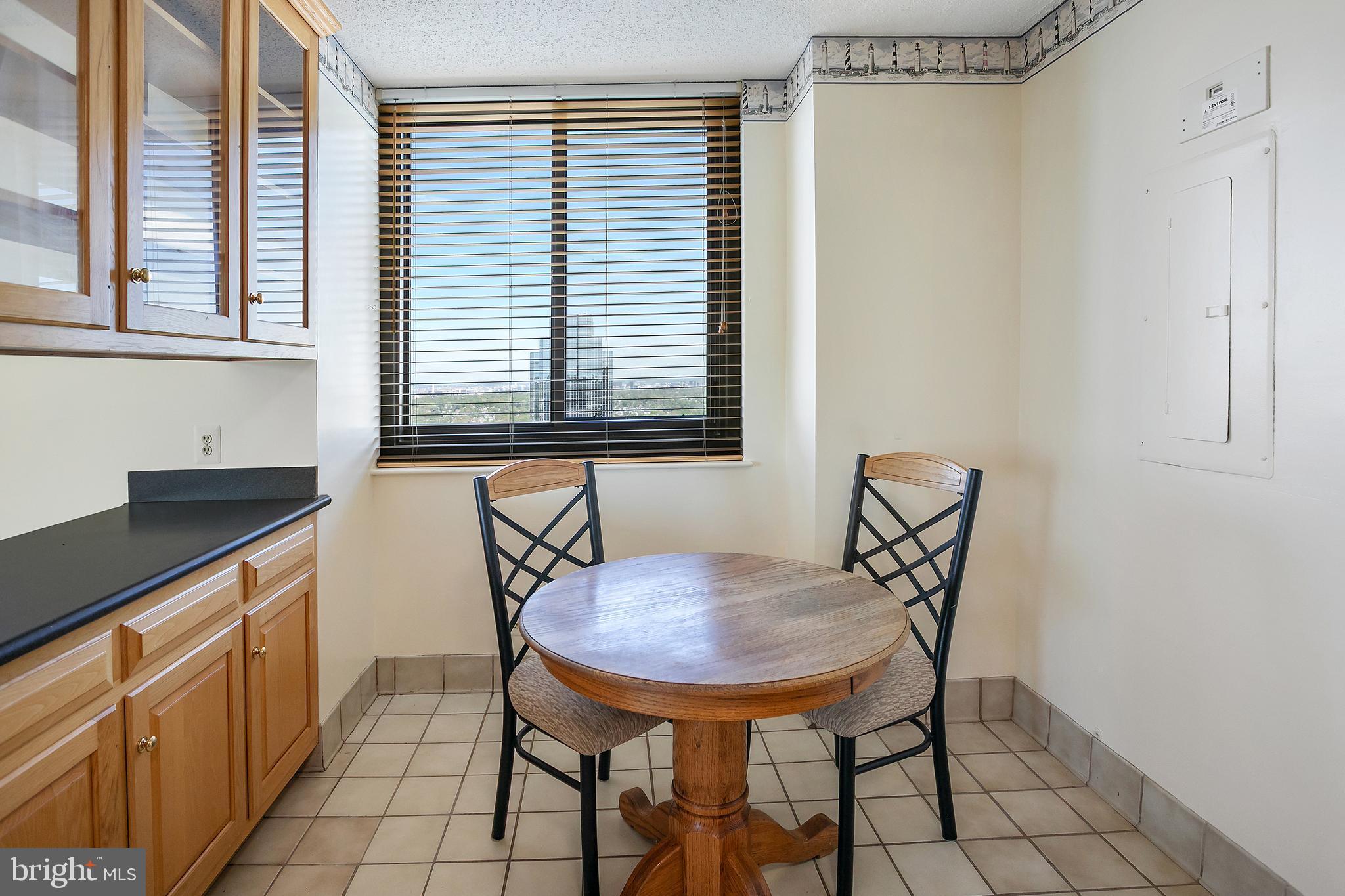 5505 Seminary Road, Unit 2605N Falls Church, VA 22041 - Photo 4 of 53 a dining room with furniture and window