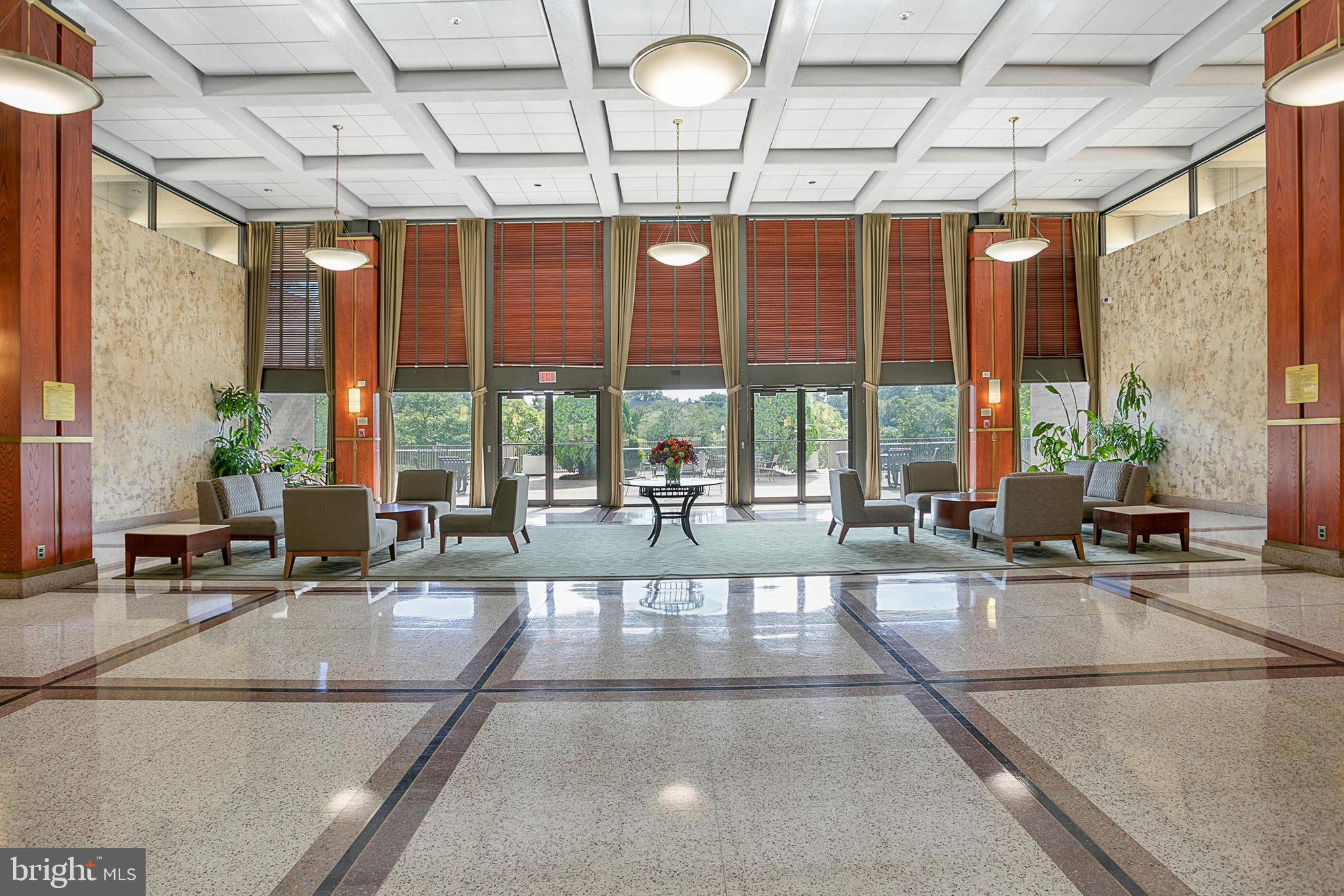 5505 Seminary Road, Unit 2605N Falls Church, VA 22041 - Photo 45 of 53 a living room with large windows and furniture