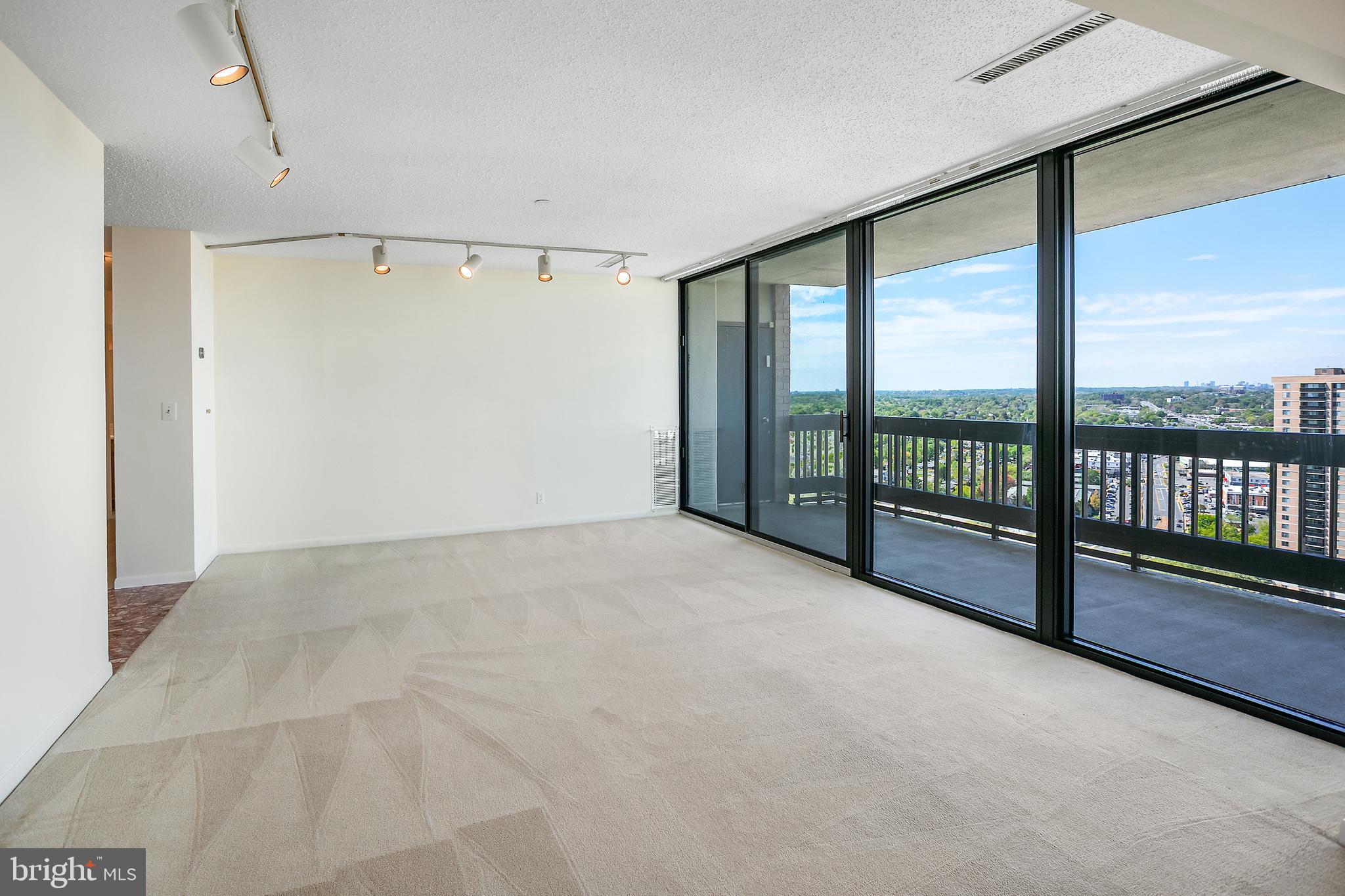 5505 Seminary Road, Unit 2605N Falls Church, VA 22041 - Photo 8 of 53 a view of an empty room with a balcony