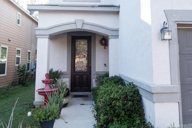 a front view of a house with an outdoor space