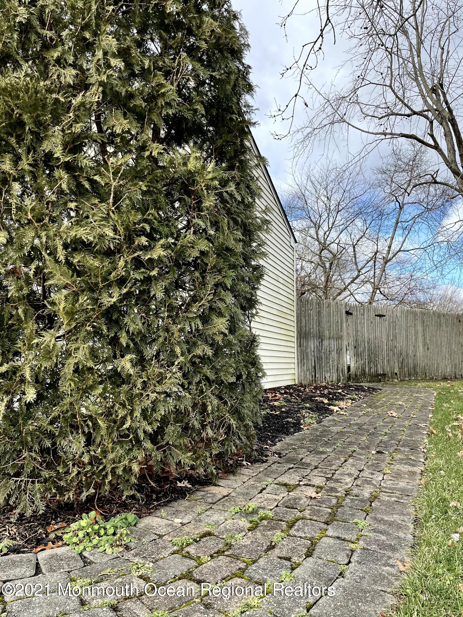 147 Stephan Road Brick, NJ 08724 - Photo 5 of 24 PATH TO BACK YARD