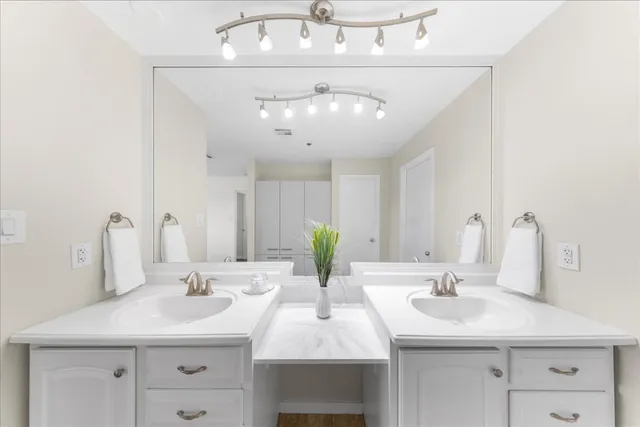 a kitchen with a sink stove and microwave