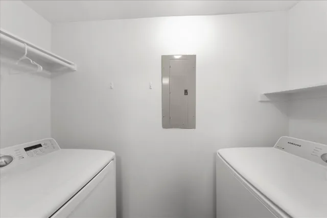 a workspace with furniture and wooden floor