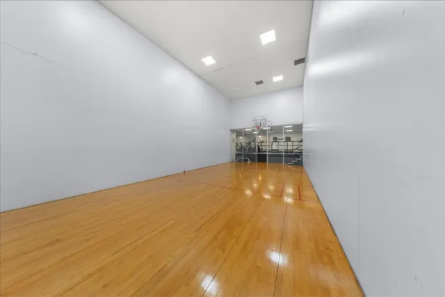 a bathroom with a sink and shower