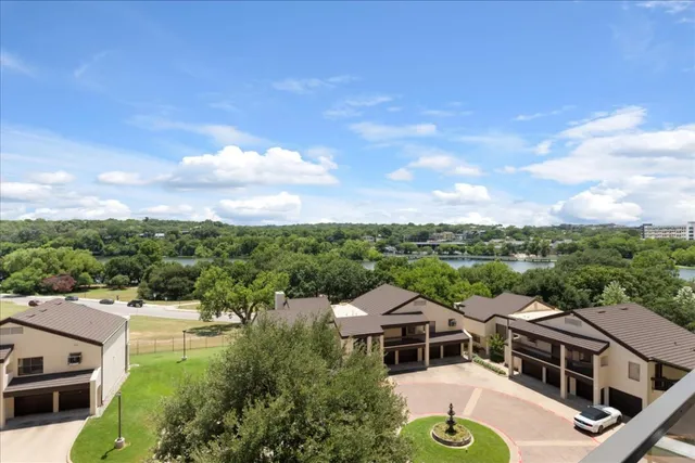 a aerial view of a house with a yard