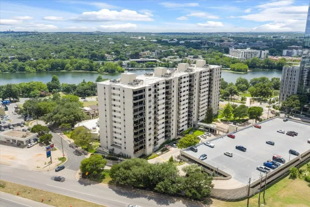 a view of a park with plants and trees