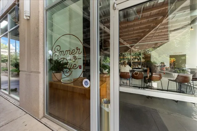 aerial view of a city with large trees