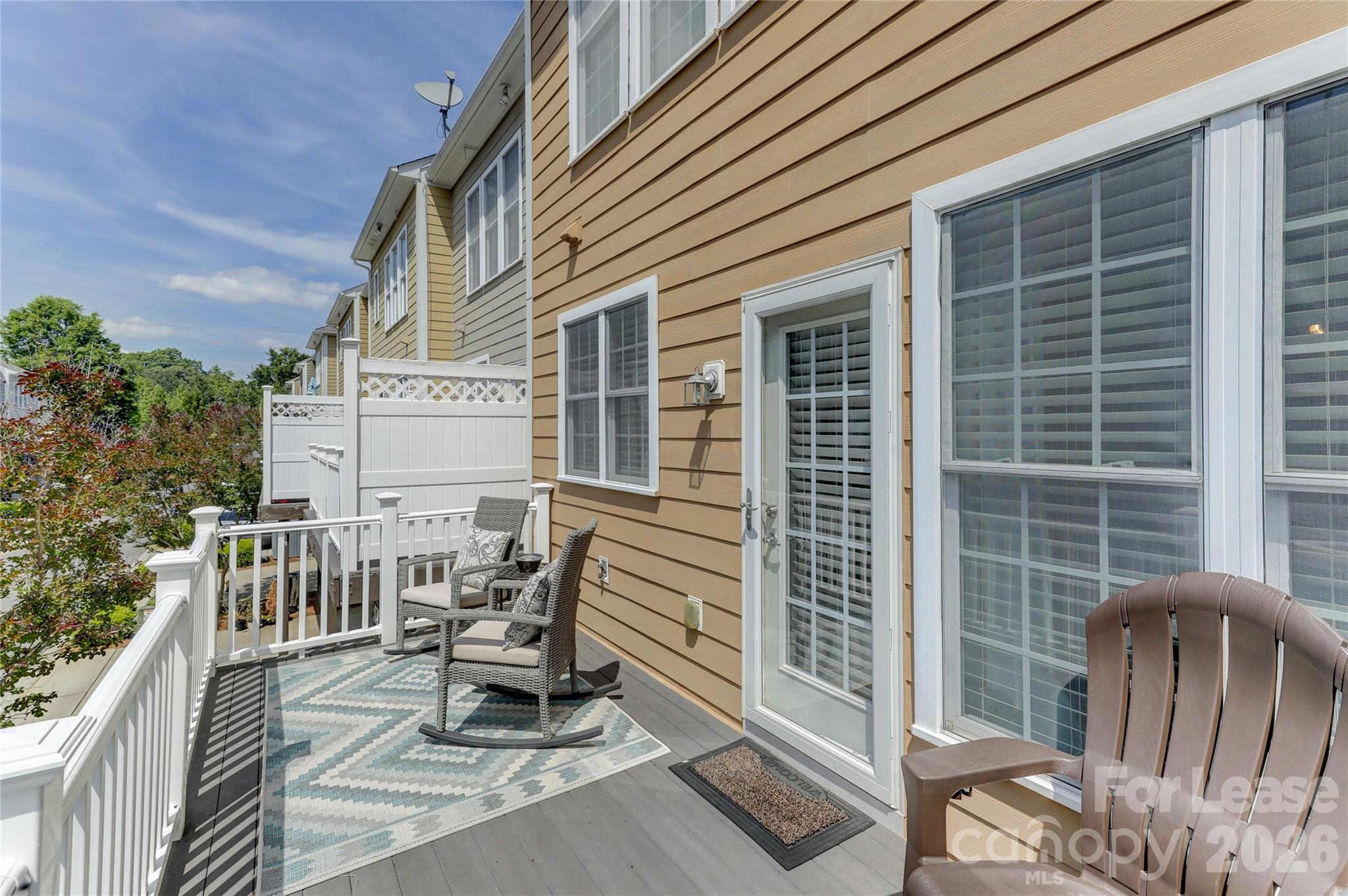 905 Lyndley Drive Fort Mill, SC 29708 - Photo 22 of 42 a view of a deck with chair and table