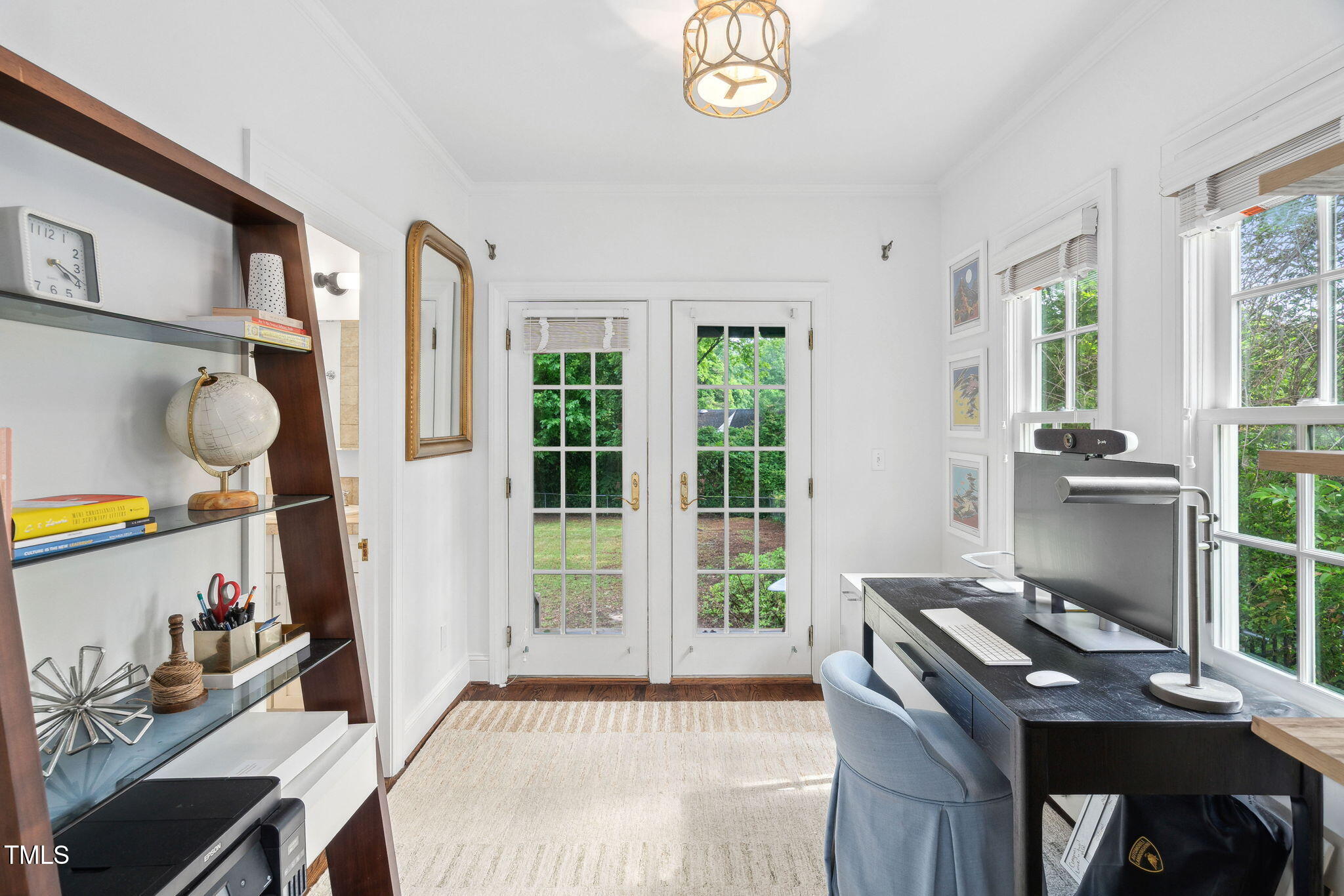 3210 Merriman Avenue Raleigh, NC 27607 - Photo 17 of 43 a workspace with furniture and a window
