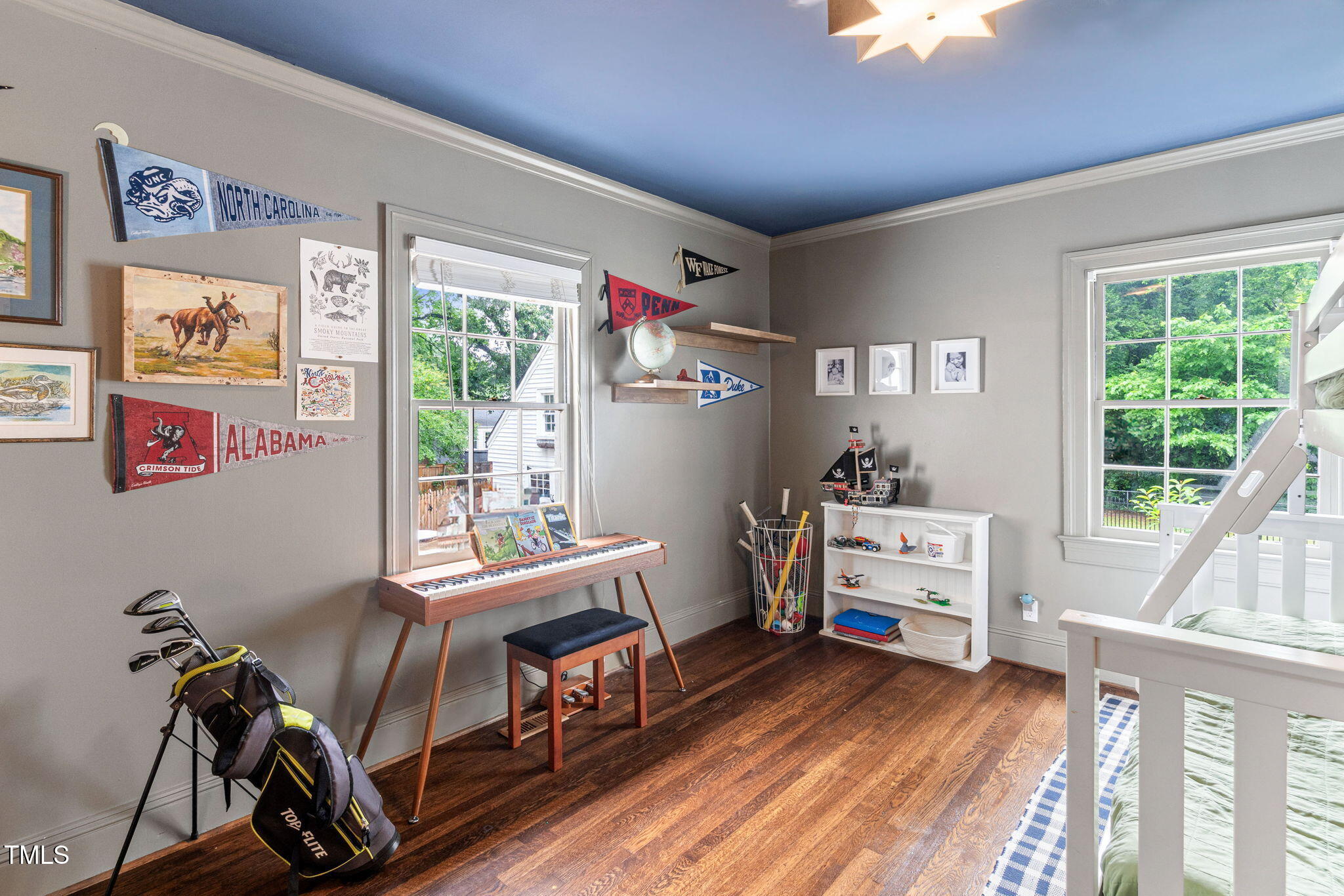 3210 Merriman Avenue Raleigh, NC 27607 - Photo 20 of 43 a view of a workspace with furniture and a window