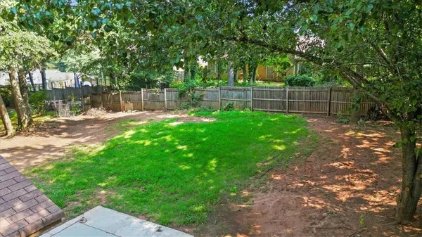 a view of a yard with a trees