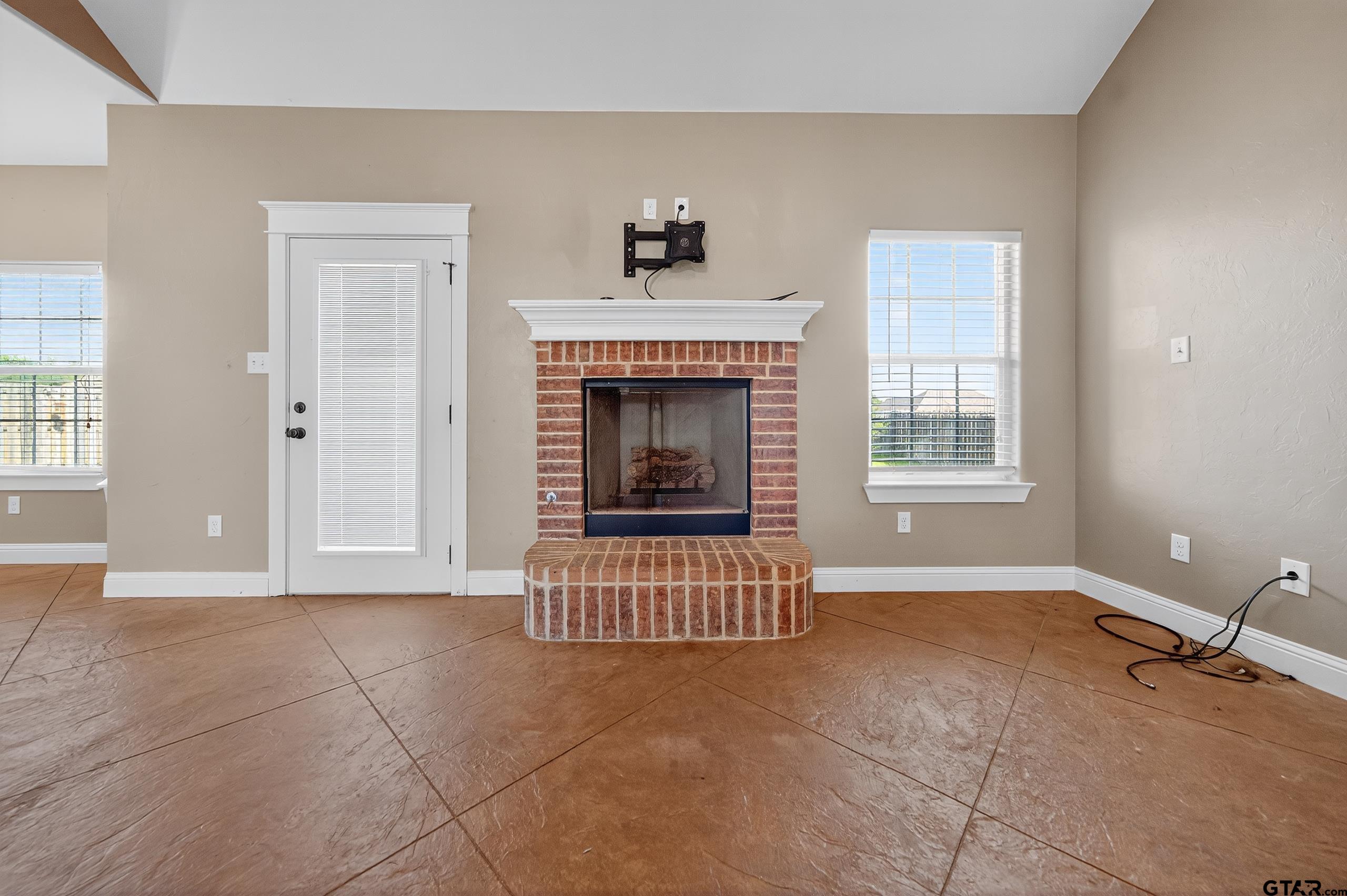 709 Linus Lane Lindale, TX 75771 - Photo 11 of 40 a view of an empty room with a window