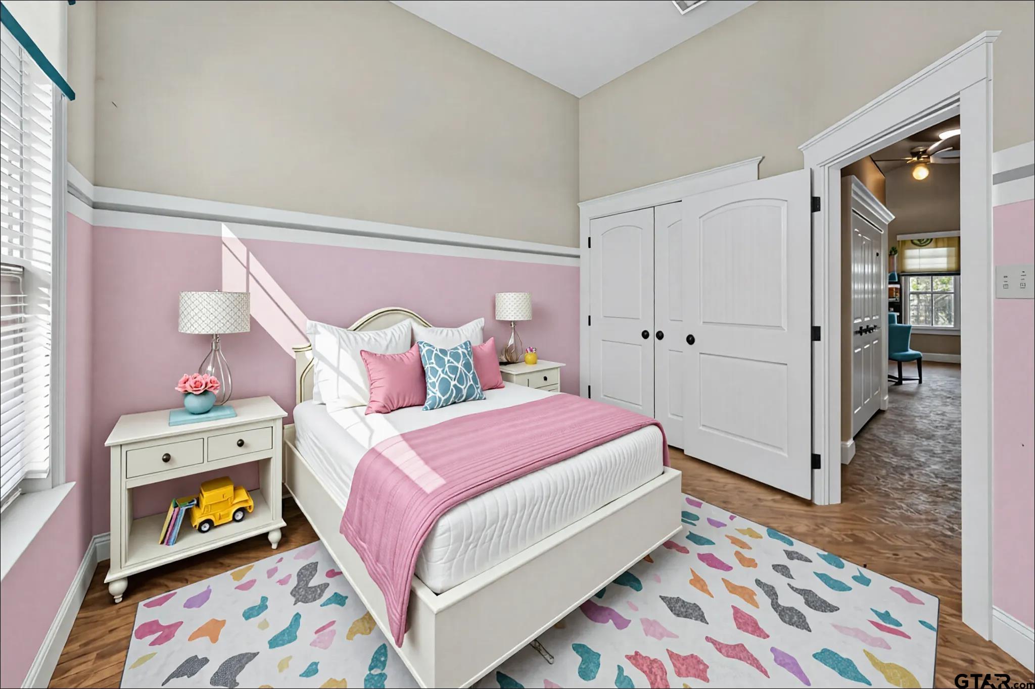 709 Linus Lane Lindale, TX 75771 - Photo 32 of 40 a bedroom with a bed and a dresser