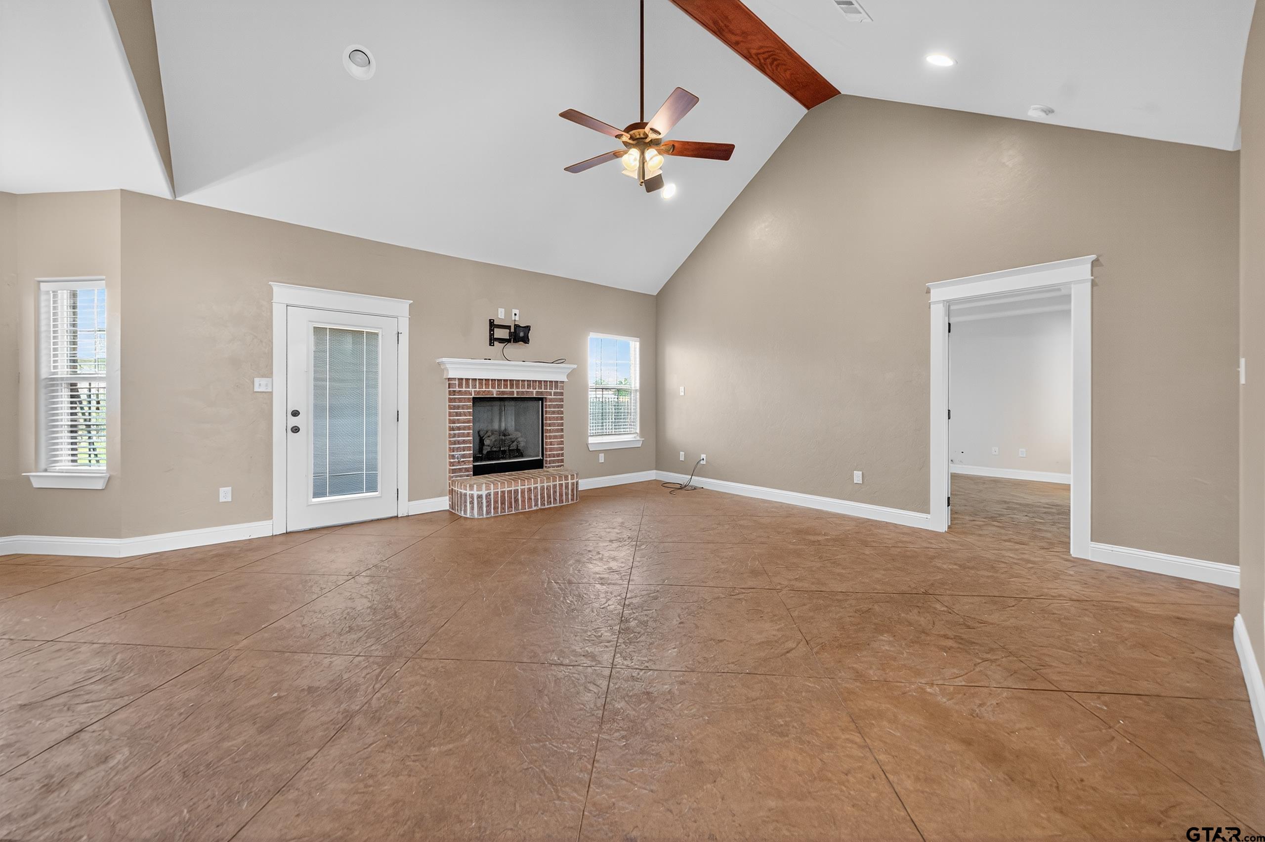 709 Linus Lane Lindale, TX 75771 - Photo 9 of 40 a view of an empty room with a fireplace