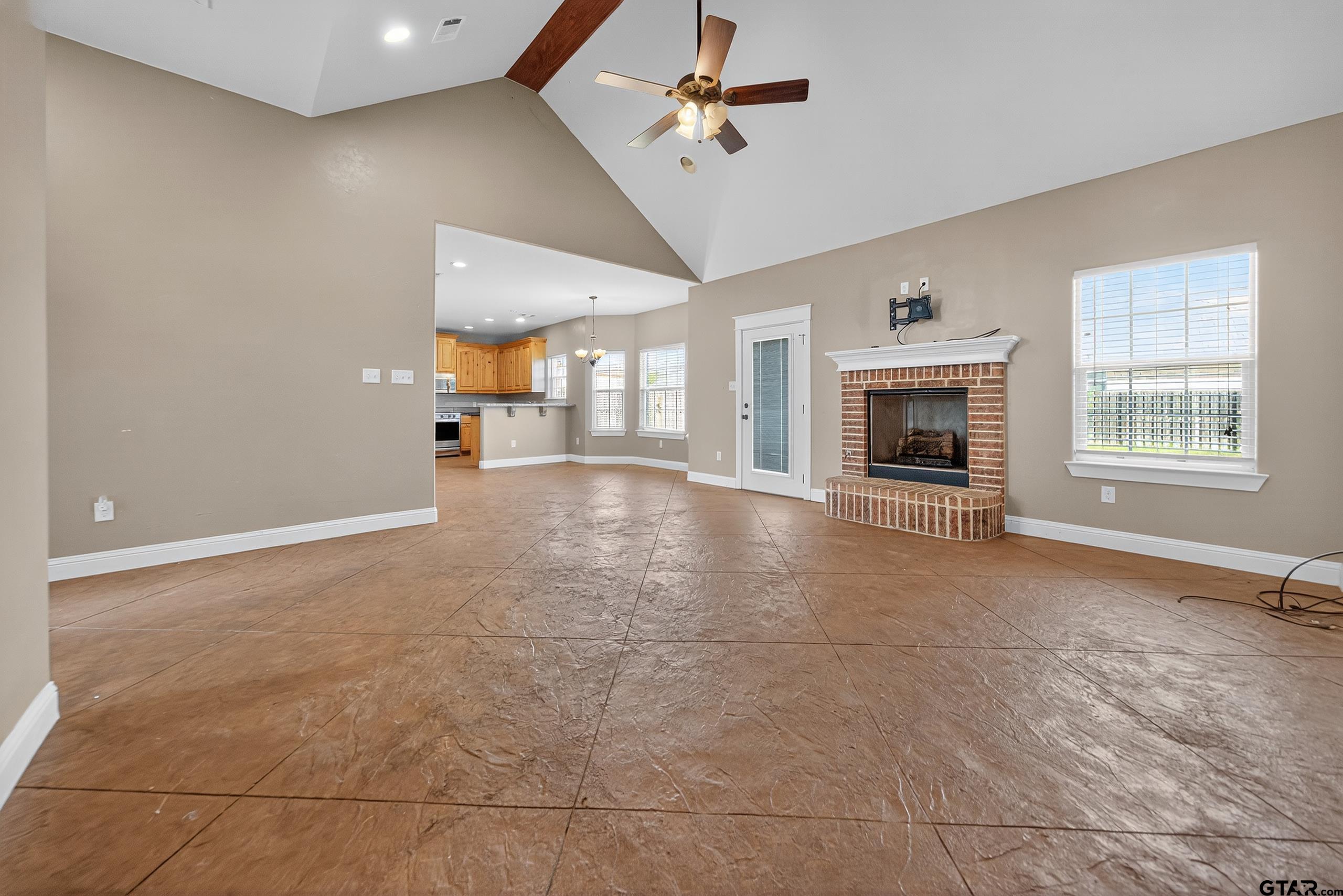 709 Linus Lane Lindale, TX 75771 - Photo 10 of 40 a view of a livingroom with a fireplace and window