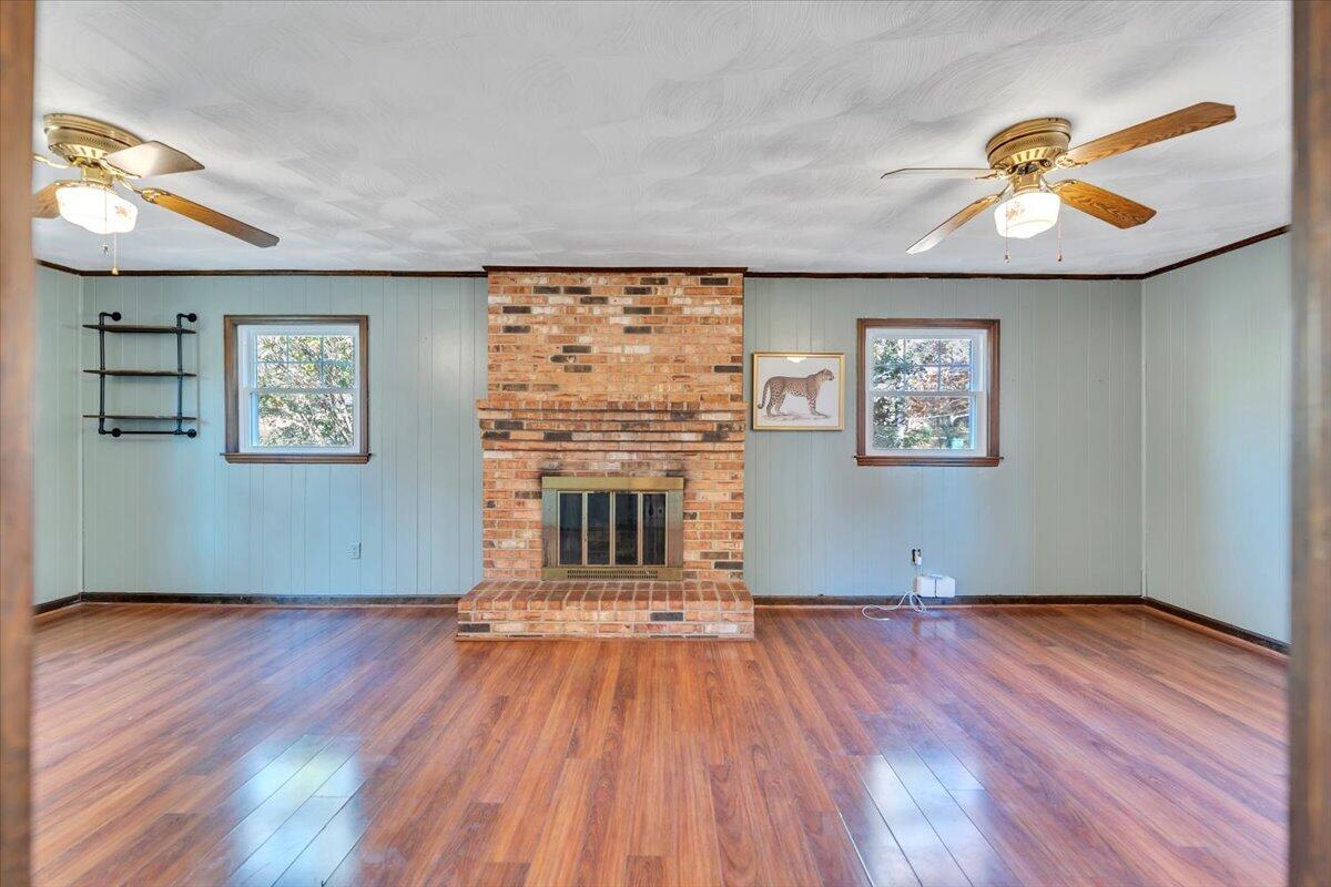 2216 East Ruritan Road Roanoke, VA 24012 - Photo 17 of 57 a view of a big room with wooden floor and windows