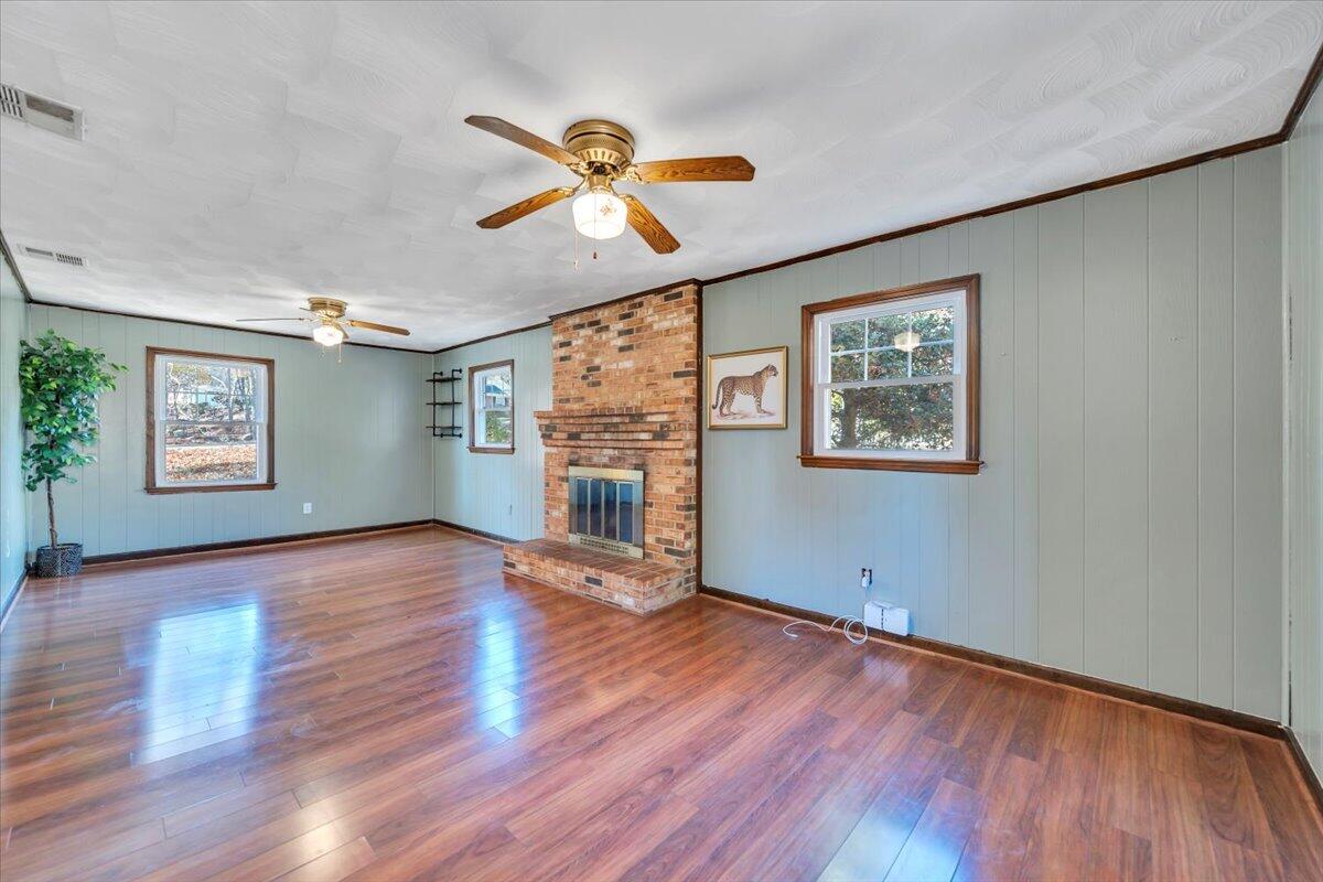 2216 East Ruritan Road Roanoke, VA 24012 - Photo 19 of 57 a view of empty room with wooden floor and fan