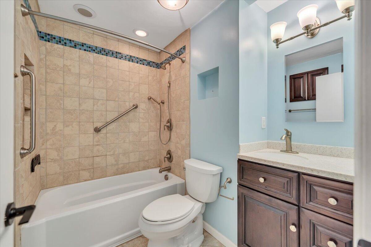 2216 East Ruritan Road Roanoke, VA 24012 - Photo 23 of 57 a bathroom with a sink a toilet and shower