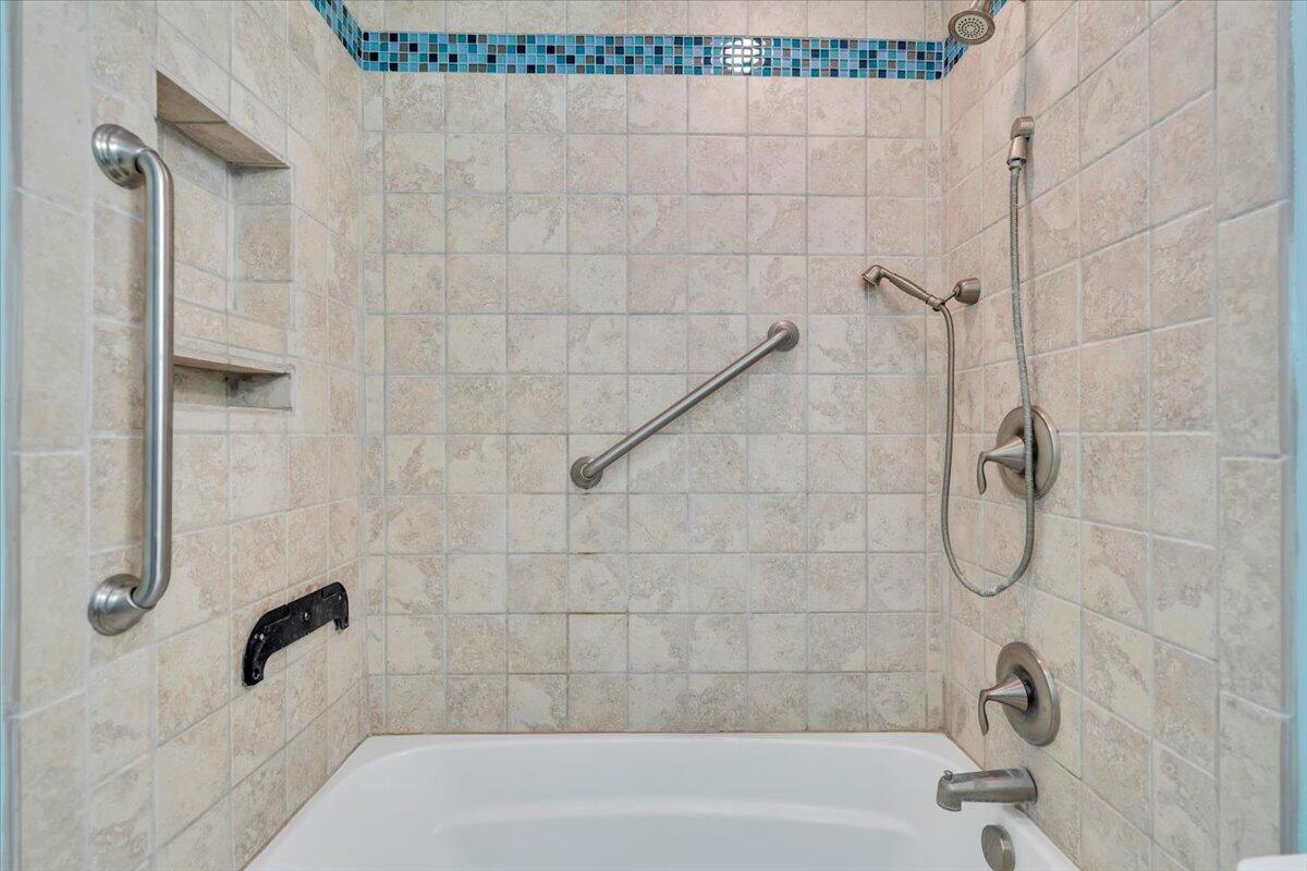 2216 East Ruritan Road Roanoke, VA 24012 - Photo 24 of 57 a bathroom with a bath tub with a shower