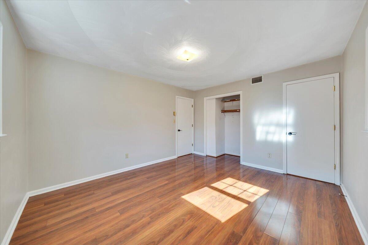 2216 East Ruritan Road Roanoke, VA 24012 - Photo 30 of 57 a view of empty room with wooden floor