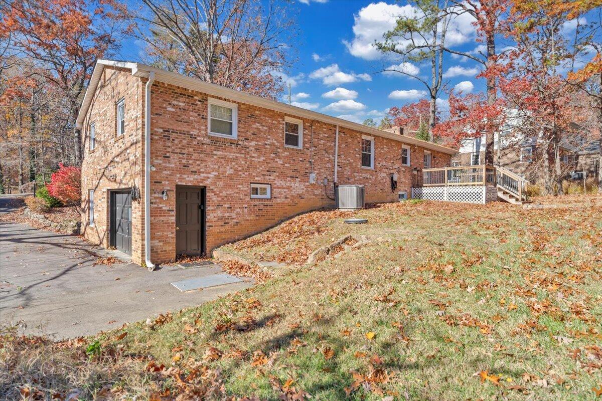 2216 East Ruritan Road Roanoke, VA 24012 - Photo 3 of 57 a large house with a large tree in front of it