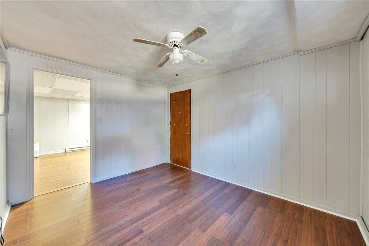 2216 East Ruritan Road Roanoke, VA 24012 - Photo 35 of 57 a view of an empty room with wooden floor