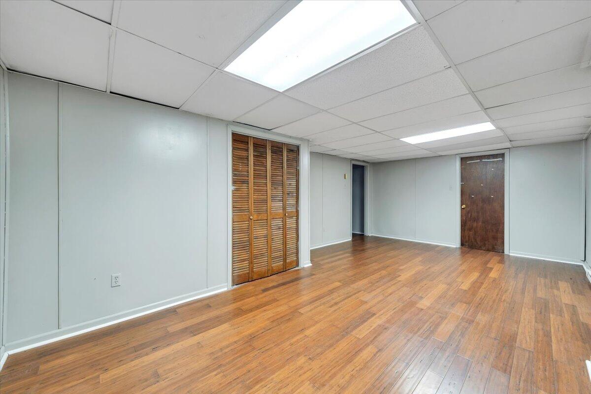 2216 East Ruritan Road Roanoke, VA 24012 - Photo 43 of 57 a view of empty room with wooden floor