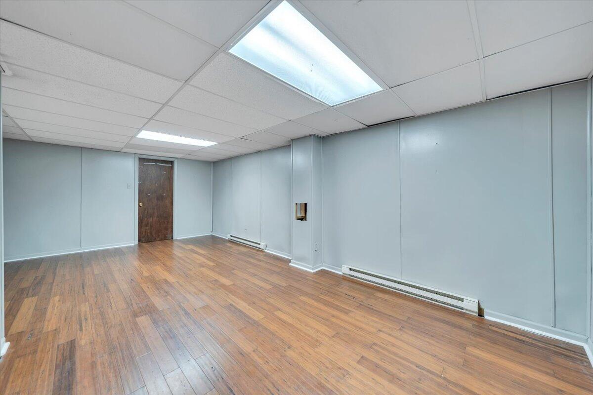 2216 East Ruritan Road Roanoke, VA 24012 - Photo 44 of 57 a view of empty room with wooden floor