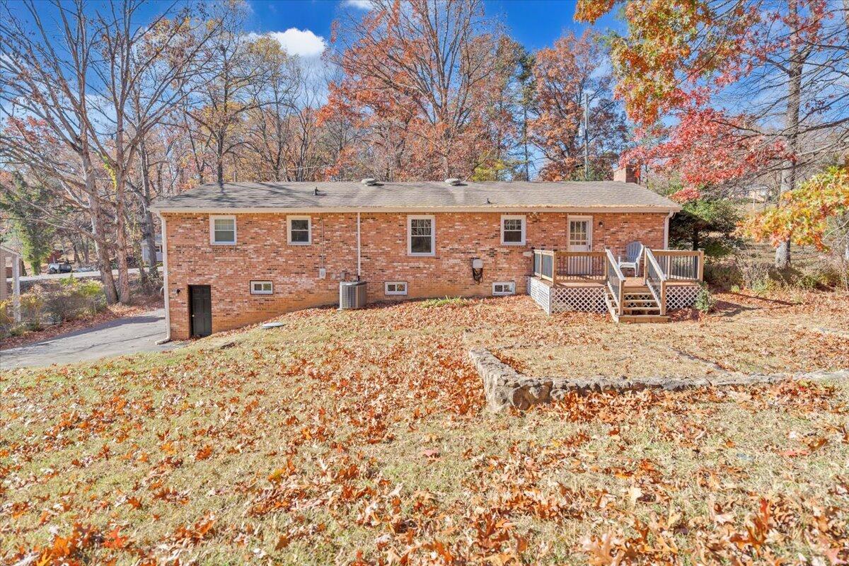 2216 East Ruritan Road Roanoke, VA 24012 - Photo 49 of 57 a front view of a house with a yard covered in snow