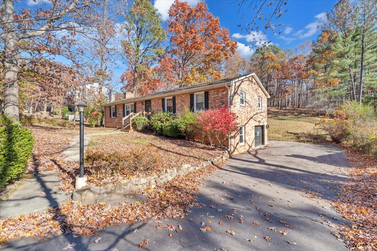 2216 East Ruritan Road Roanoke, VA 24012 - Photo 52 of 57 a front view of a house with a yard