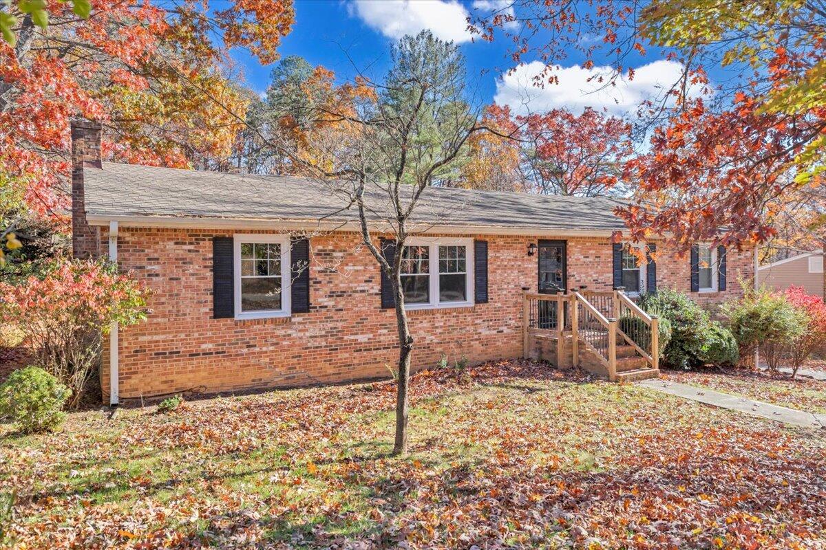 2216 East Ruritan Road Roanoke, VA 24012 - Photo 53 of 57 a front view of a house with a yard