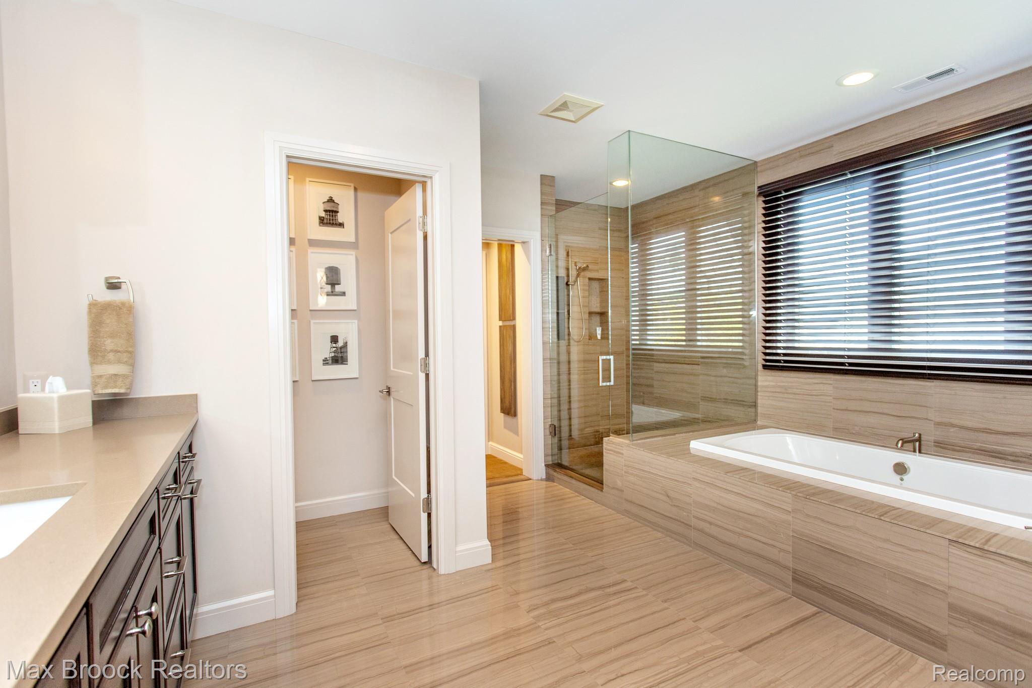 25925 York Road Royal Oak, MI 48067 - Photo 53 of 88 Bathroom with a garden tub, vanity, a shower stall, and recessed lighting