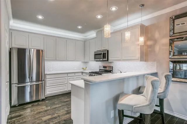 a lobby with furniture and a potted plant