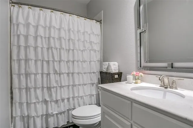 a view of a dining room with furniture and window