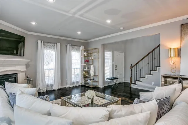 a living room with furniture or fireplace and a flat screen tv