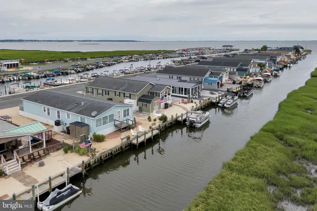 a view of house with swimming pool yard and outdoor seating