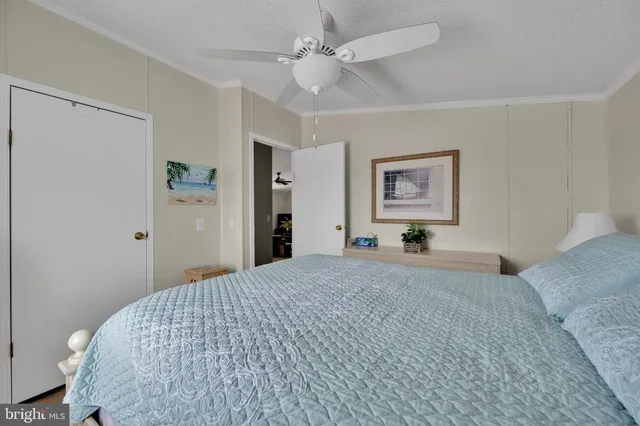 a view of a house with wooden roof and sitting space