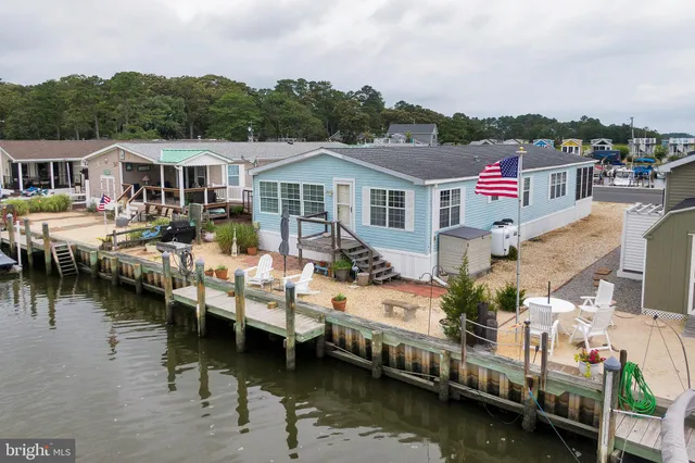 a view of a swimming pool with an outdoor seating