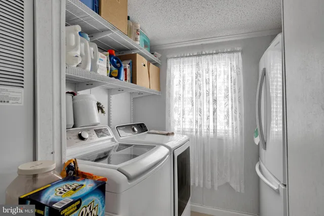 an aerial view of a house with outdoor space