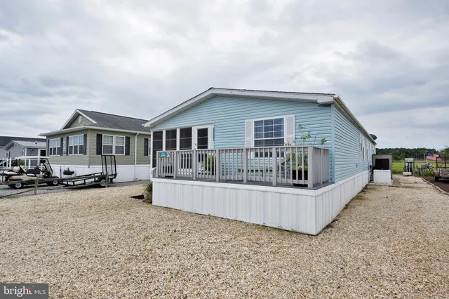 a view of a swimming pool with an outdoor seating