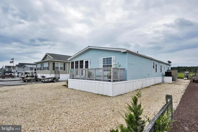 a view of a golf course with a lake