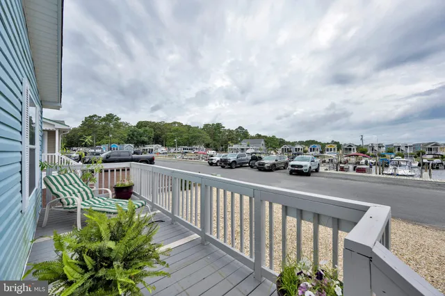 a view of a lake with a yard