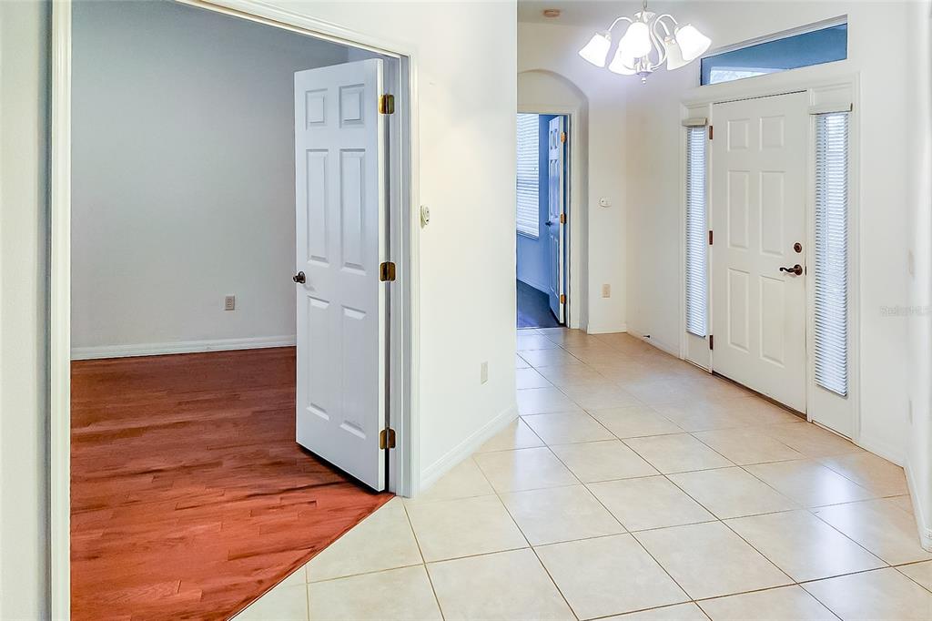 16299 Southwest 14th Avenue Road Ocala, FL 34473 - Photo 15 of 50 an empty room with wooden floor